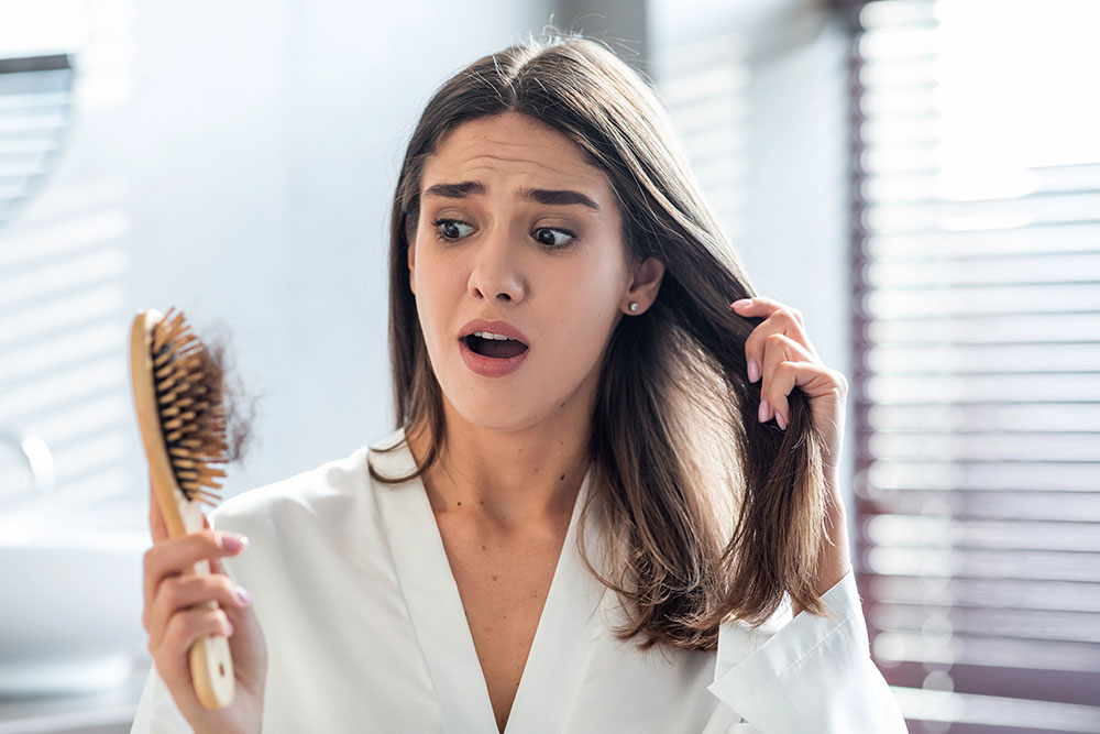 Postpartum Hair Loss: Everything You Need To Know